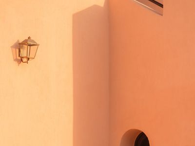 Geometric figures in soft pink glow