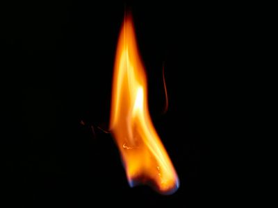 Sparks of light against dark background